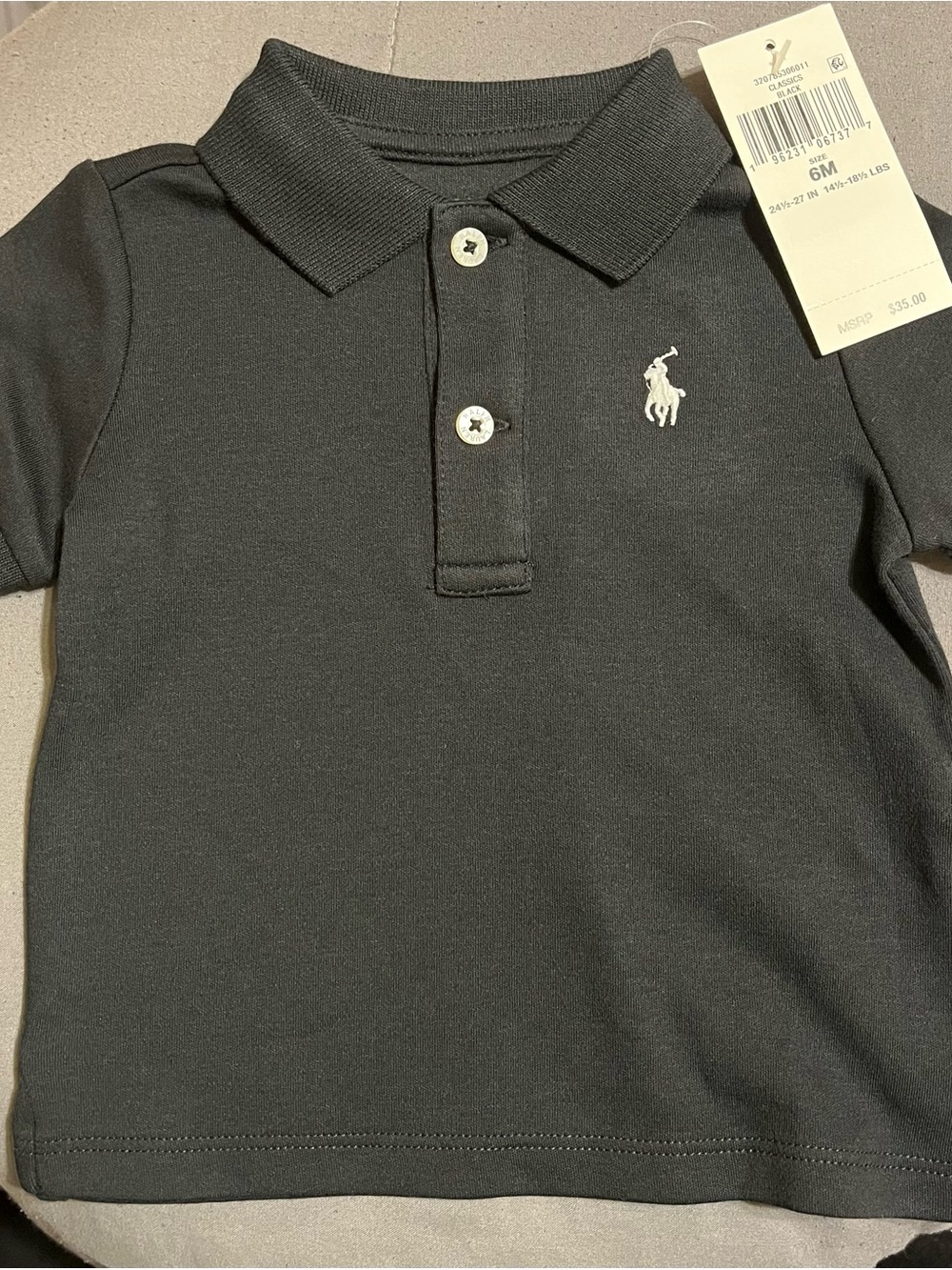 Classic Black Polo Shirt with White Embroidered Logo
